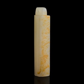 A Chinese white and russet jade feather holder, 19th century