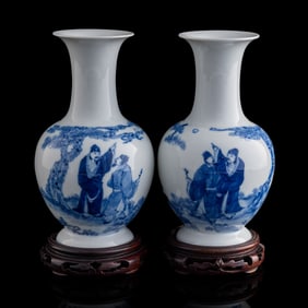 A pair of Chinese blue and white 'figural' vases, late 19th century