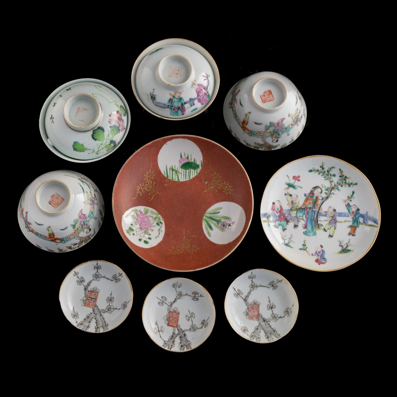 Nine Chinese famille rose plates, cups and dishes, Qing dynasty: Nine Chinese famille rose plates, cups and dishes Qing dynasty Comprising three saucer dishes, two plates, and four cups, two with lids. All with character mark to underside. (9). H: 1 1/8, Dia: 6 1/4