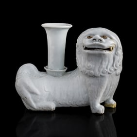 A Chinese white-glazed lion-form flower holder, 19th century