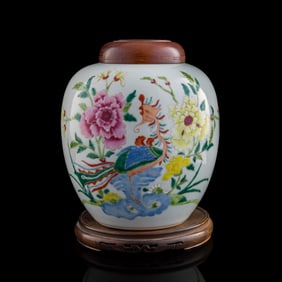 A Chinese famille rose 'phoenix and peony' lidded jar, Yongzheng period, Qing dynasty