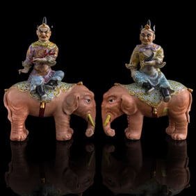 A pair of Chinese famille rose figures of Hu people on elephants, Republic period