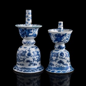 Two Chinese blue and white 'dragon' candlesticks, 19th century