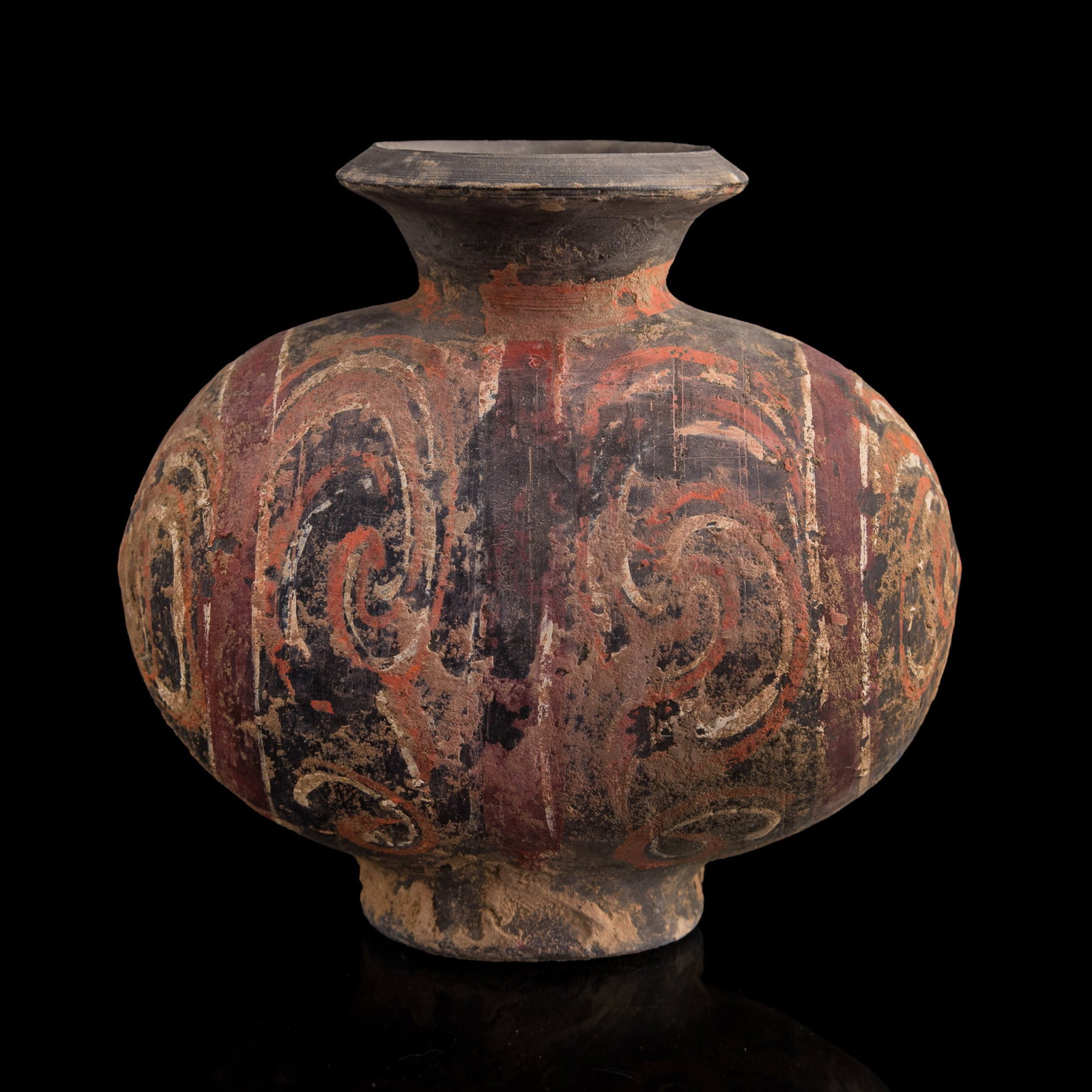A Chinese painted pottery jar, Han dynasty: A Chinese painted pottery jar Han dynasty H: 4 3/4, W: 5, D: 3 1/2 in. (H: 12.07, W: 12.70, D: 8.89 cm.) Private estate, Palm Springs, California. Click here for high