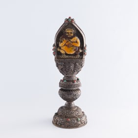 A Mongolian silver amber-inlaid ritual item, 19th century