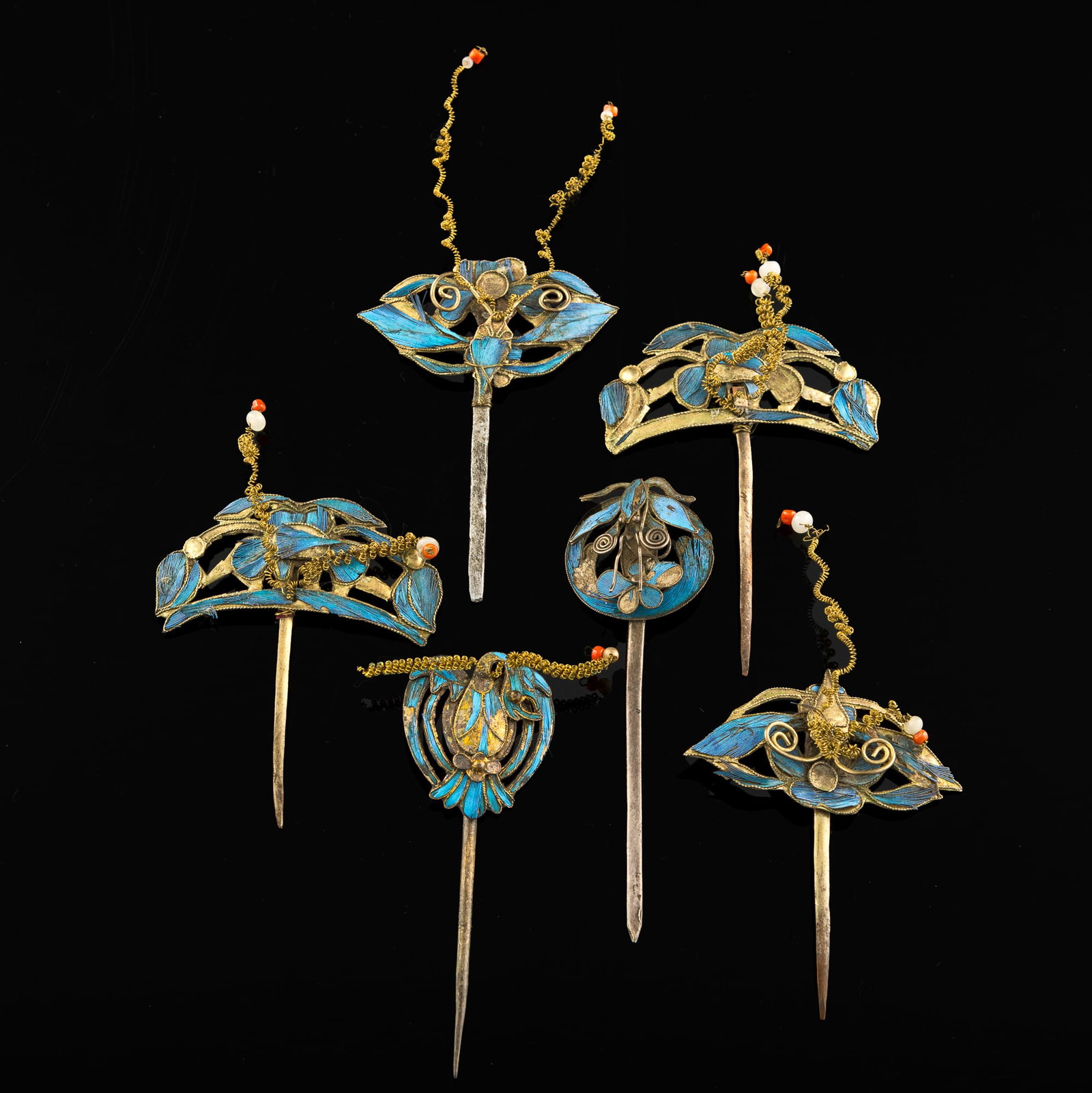 Six Chinese kingfisher feather hair pins, 19th century: Six Chinese kingfisher feather hair pins 19th century Comprising six bird and butterfly design hairpins. (6). L: 3 1/4, W: 1 in. (L: 8.26, W: 2.54 cm. (longest)) From Mr. Ku, New Jersey. Acquired from