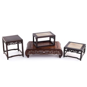 Four Chinese square hardwood stands, 19th/early 20th century