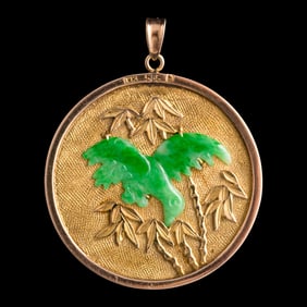A Chinese 14K gold with jadeite 'Fu' pendant