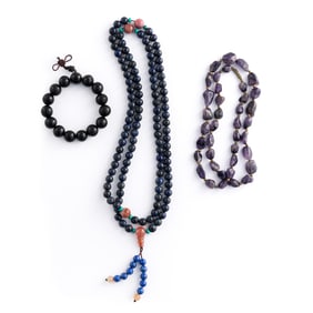 Two Chinese bead necklaces and a bracelet