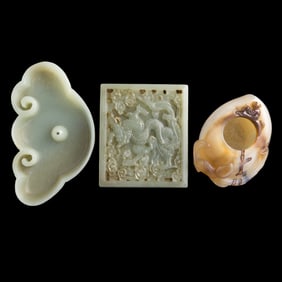 Two Chinese jade and an agate carving