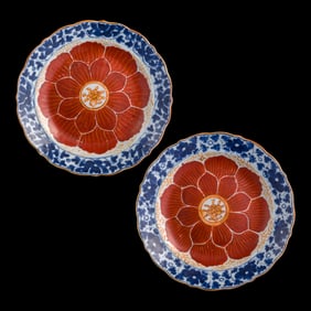 A pair of Chinese export blue and enamel 'floral' plates, 18th century