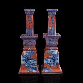 A pair of Chinese blue and iron-red candlesticks, 19th century