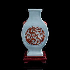 A Chinese celadon-glazed iron-red 'dragon' vase, Qing dynasty