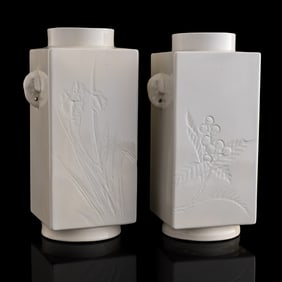 A pair of Chinese blanc-de-chine elephant-handled cong vases, late 19th century