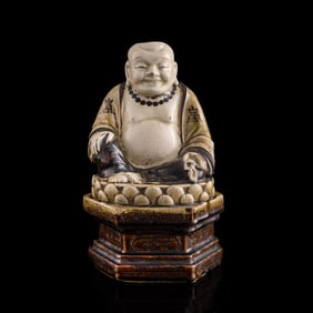 A Chinese Cizhou-kiln Maitreya Buddha, 18th century or earlier