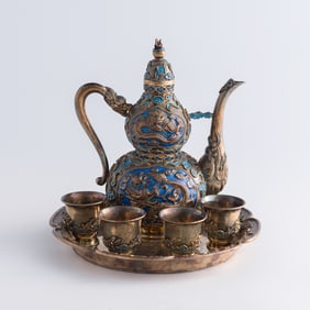 A set of Chinese silver enamel jug, cups and tray