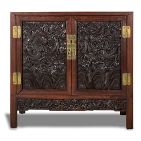 A Chinese hardwood 'dragon' cabinet, 19th century