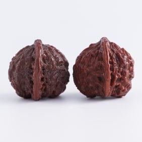 A pair of Chinese walnut shells, Guangxu period, Qing dynasty