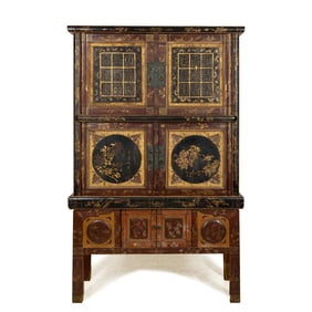 A Chinese red lacquer painted cabinet, 17th/18th century