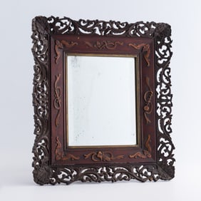 A Chinese hardwood framed mirror, Republic period