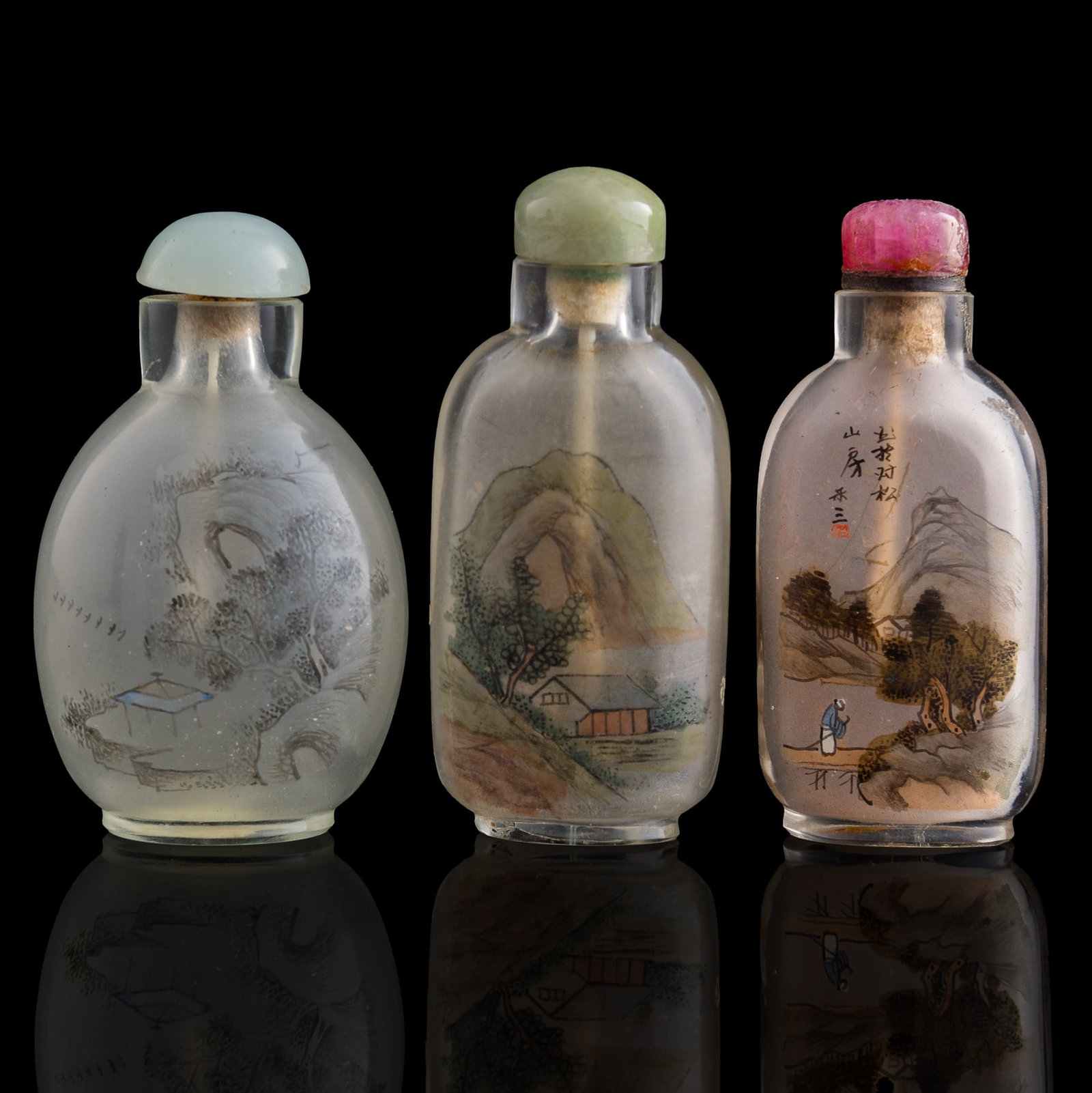 Three Chinese reverse-painted snuff bottles, early 20th century: Three Chinese reverse-painted snuff bottles early 20th century All painted with landscape scenes. (3). H: 2 1/2, W: 1 1/4, D: 3/4 in. (H: 6.35, W: 3.18, D: 1.91 cm. (tallest)) Collection of Mr. Kleema
