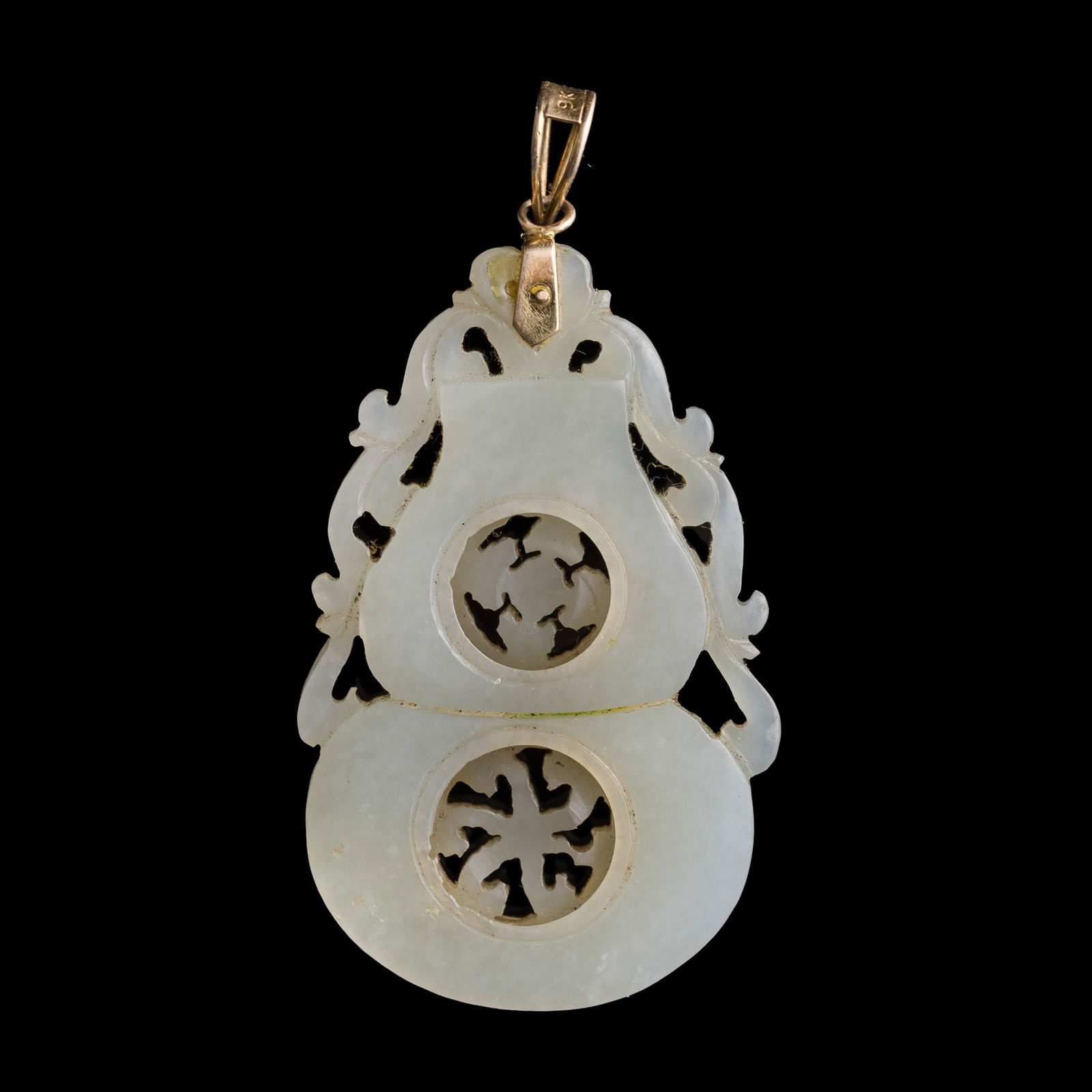 A Chinese white jade rotating gourd-form pendant, early 19th century: A Chinese white jade rotating gourd-form pendant early 19th century H: 2 1/4, W: 1 1/2, D: 1/4 in. (H: 5.72, W: 3.81, D: 0.64 cm.) From Mrs. Kiang, Newport Coast, California; inherited from her late h