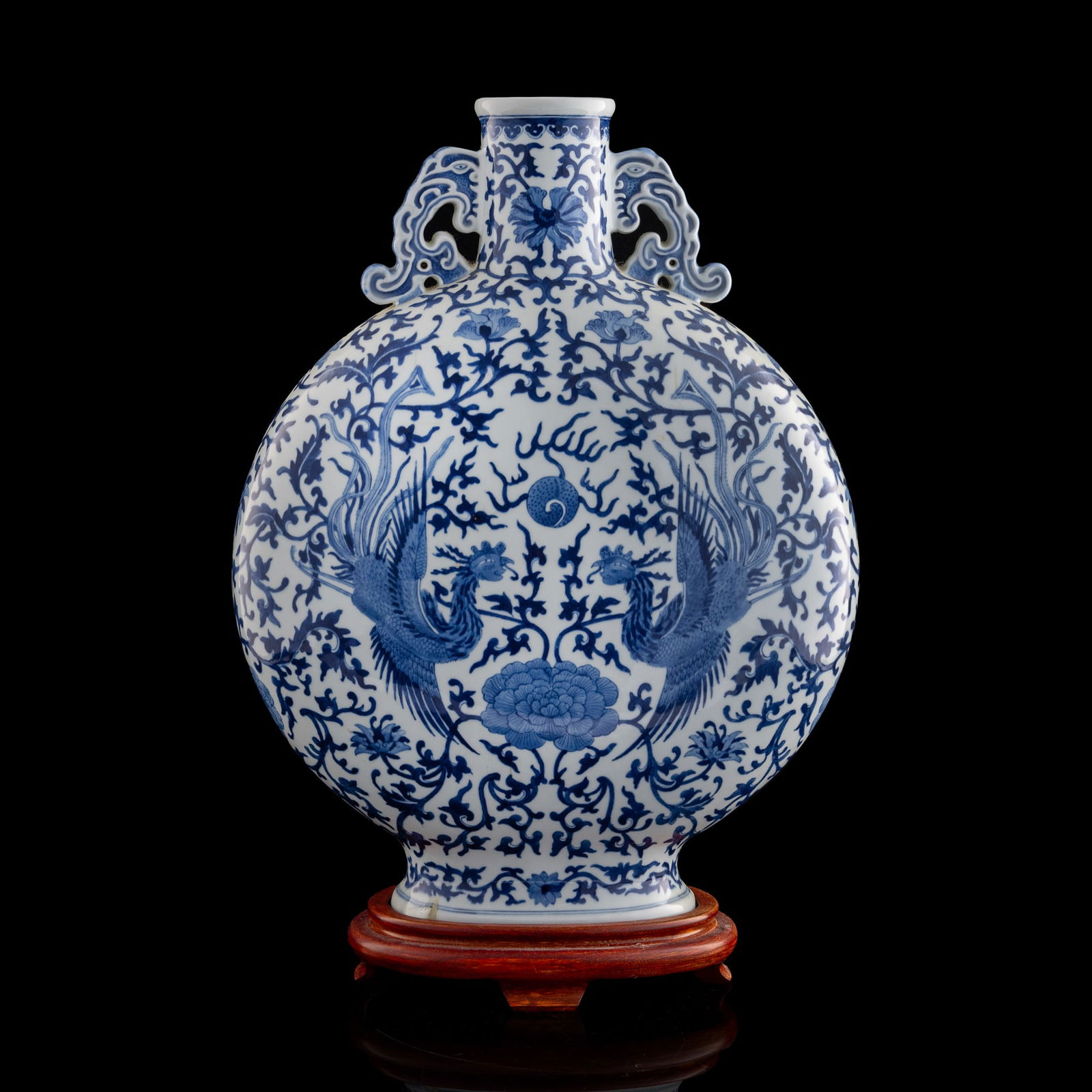 A Chinese blue and white 'phoenix' moonflask, Tongzhi period, Qing dynasty (1 of 11)