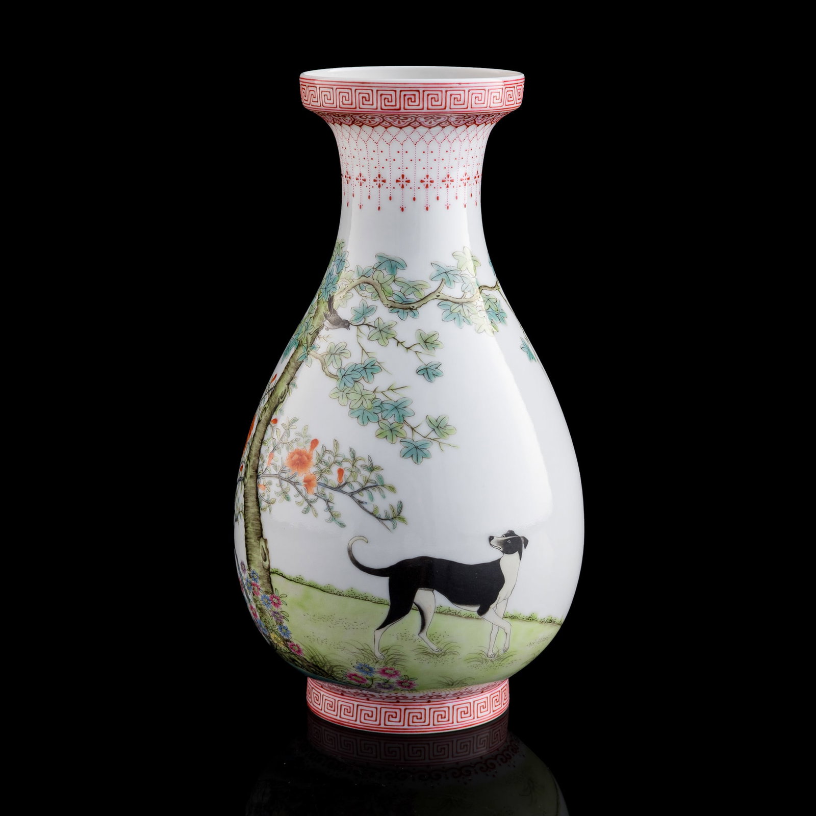 A Chinese falangcai-style 'hound' vase, Republic period: A Chinese falangcai-style 'hound' vase Republic period Imitating falangcai, the body painted with a continuous scene of a black-and-white hound among trees, rocks, and grasses, inscribed with a poem a