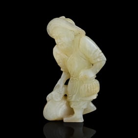 A Chinese russet jade fisherman pendant, 18th century