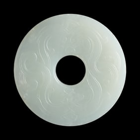 A Chinese white jade 'chilong' bi disc, 18th century