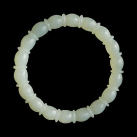 A Chinese jade lotus root-form bangle, 18th century
