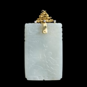 A Chinese carved white jade plaque, early 19th century