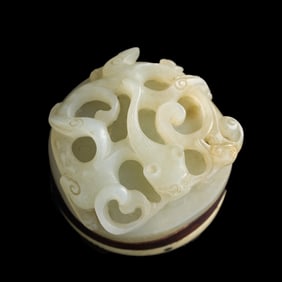 A Chinese white jade 'chilong' finial, 18th century