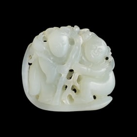 A Chinese carved white jade 'Hehe Erxian' pendant, 19th century
