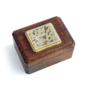 A Chinese hardwood box inlaid with jade 'dragon' plaque, Ming dynasty