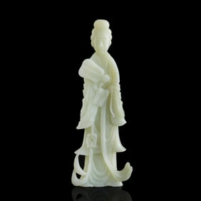 A Chinese carved white jade court lady holding fan, 19th century