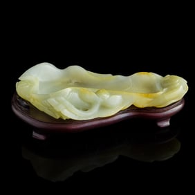 A Chinese white jade lotus leaf-form washer, 18th/19th century