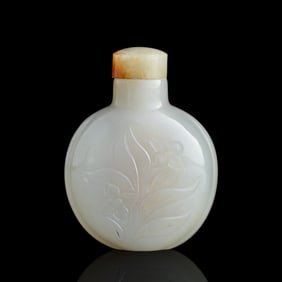 A Chinese white jade 'floral' snuff bottle, 19th century