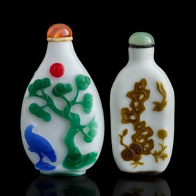 Two Chinese overlay Peking snuff bottles, 19th Century