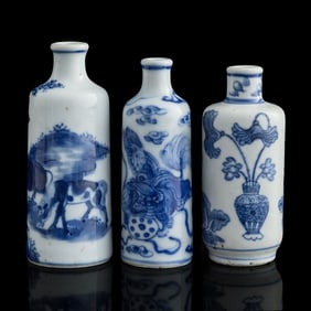 Three Chinese blue and white snuff bottles, 19th century