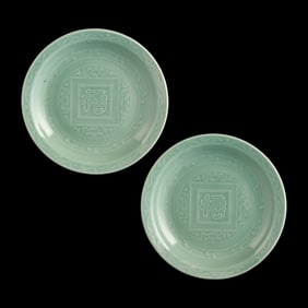 A pair of Chinese celadon “Fu" character plates, early 19th century