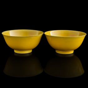 A pair of Chinese yellow-glazed bowls, Xuantong period, Qing dynasty