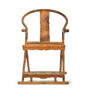 A Chinese Huanghuali Ming-style folding armchair