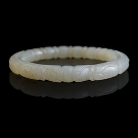 A Chinese white jade bangle, 18th century