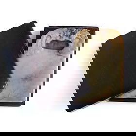 A Chinese jade inkstone, Ming dynasty or earlier: A Chinese jade inkstone Ming dynasty or earlier Inscribed with "the first year of the Han dynasty" to the jade verso. Sold with an associated hardwood box. H: 7 1/4, W: 5, D: 3/4 in. (H: 18.42, W: 12.