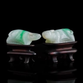 A pair of Chinese jadeite reclining oxen, 19th century