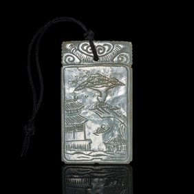 A Chinese carved white jade 'landscape' plaque, early 19th century