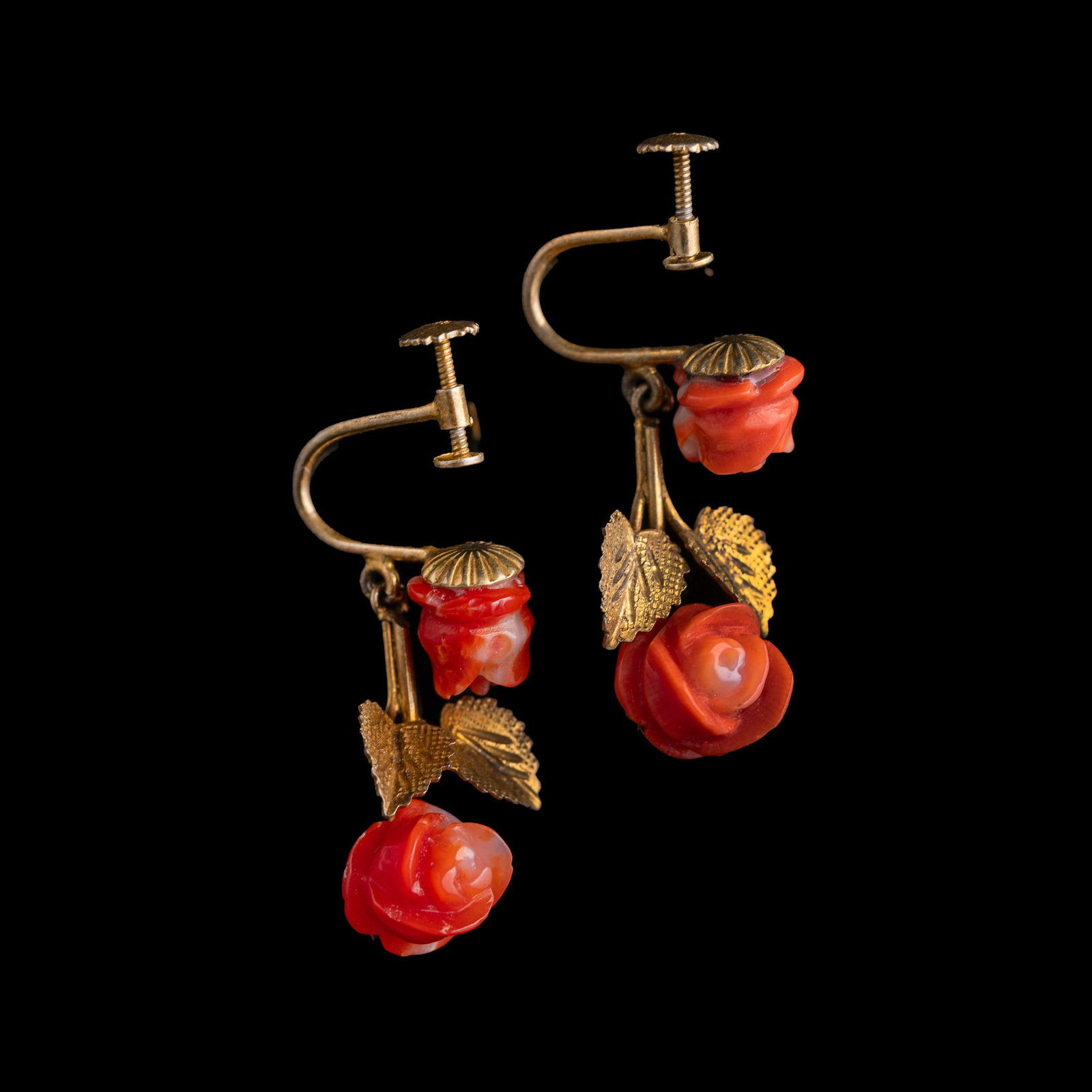 A pair of Chinese coral earrings, Republic period: A pair of Chinese coral earrings Republic period Each with "835" mark to the back. (2). H: 1 1/2, W: 5/8, D: 3/8 in. (H: 3.81, W: 1.59, D: 0.95 cm. (each)) Weight: 5 g (overall) From Mrs. Hillebrand i
