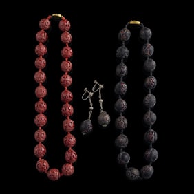 Two Chinese lacquer necklaces and a pair of earrings, Republic period