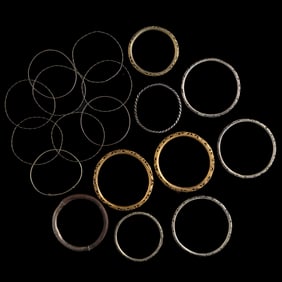 Eighteen Chinese silver bangles, 19th century